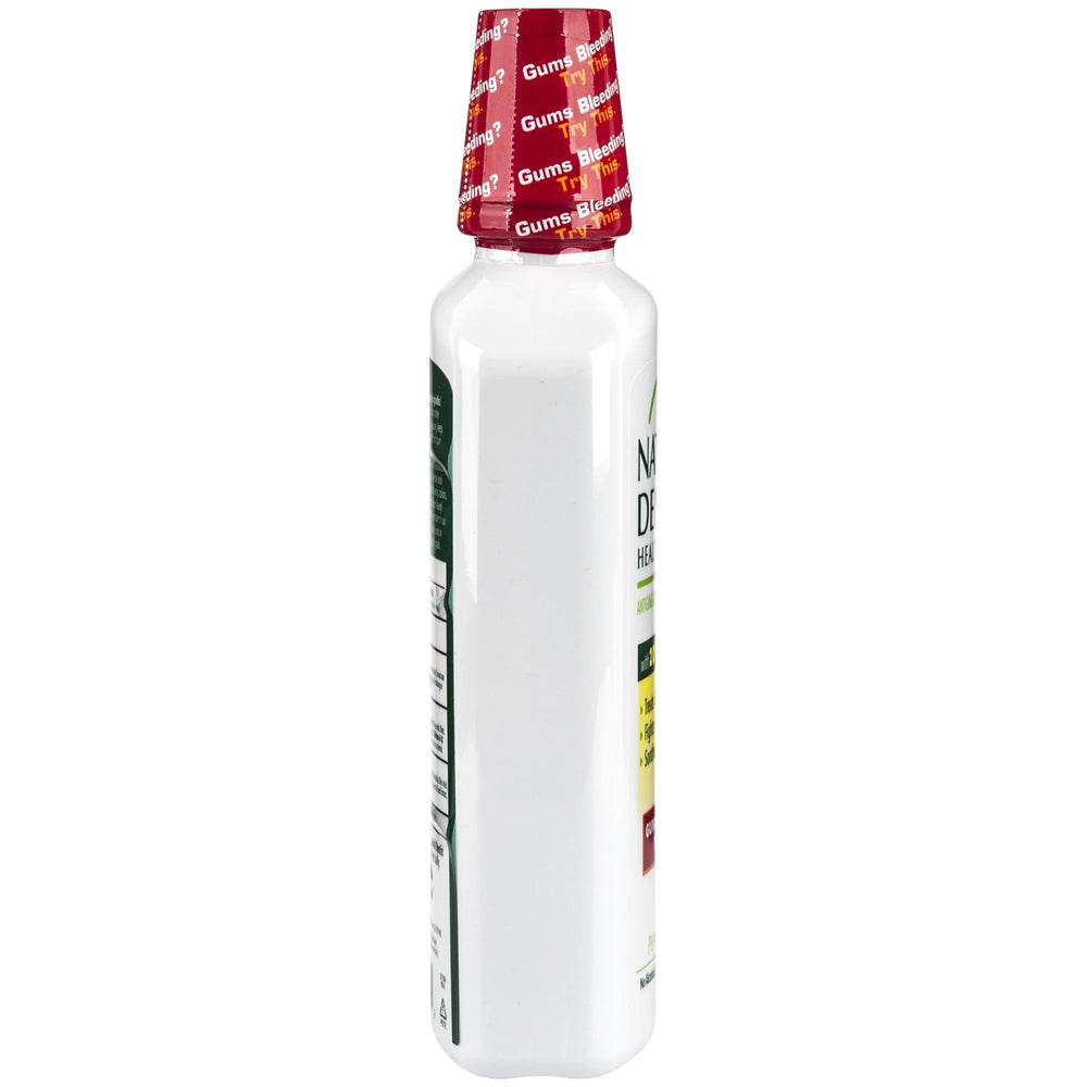 The Natural Dentist Healthy Gums Mouth Rinse Peppermint family-friendly packaging on a table
