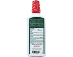 The Natural Dentist Healthy Gums Mouthwash label close-up highlights peppermint twist and gum care.