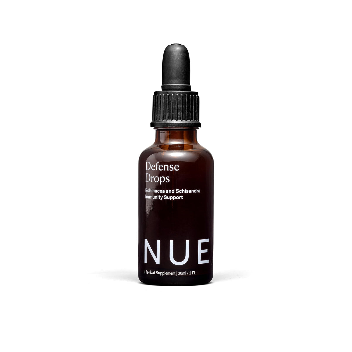 The Nue Co Defense Drops bottle with pour spout for easy daily immune support.