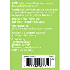 The Vitamin Shoppe turmeric 900mg capsules in close-up emphasizing high potency