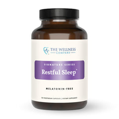The Wellness Company Restful Sleep bottle showing melatonin-free calming blend.