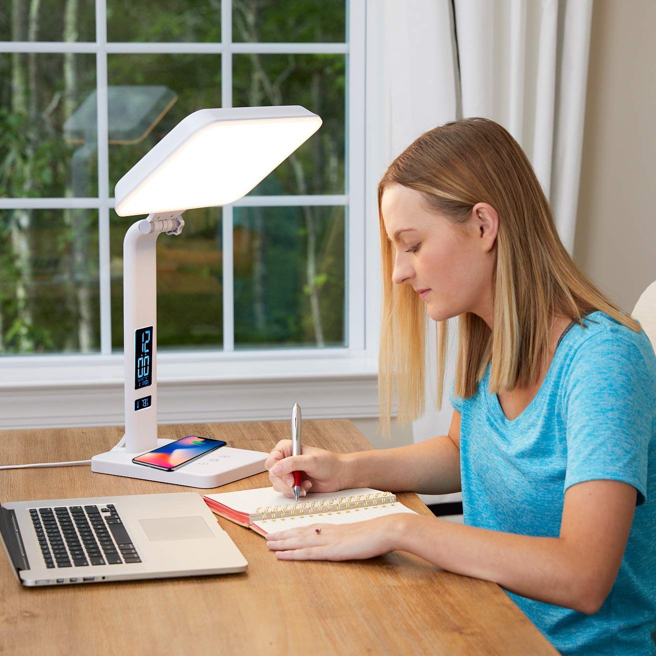 TheraLite Aura Qi lamp demonstrates alarm clock and USB port.
