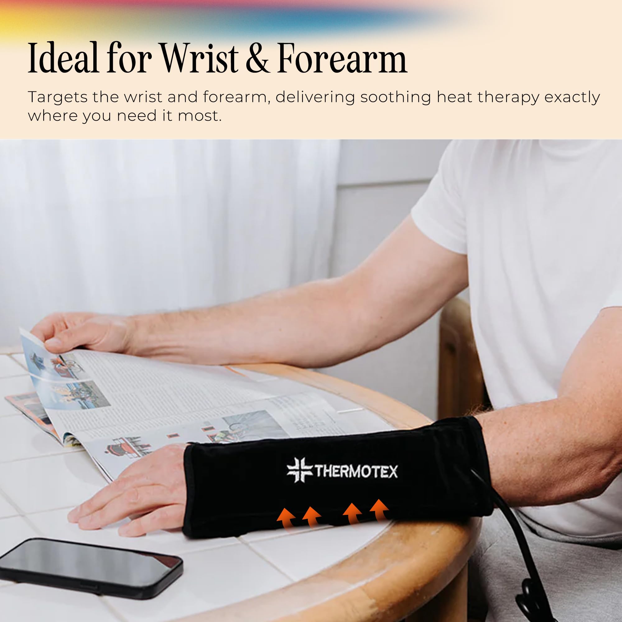 Thermotex left-wrist heating pad in use illustrating secure wrap and targeted warmth.