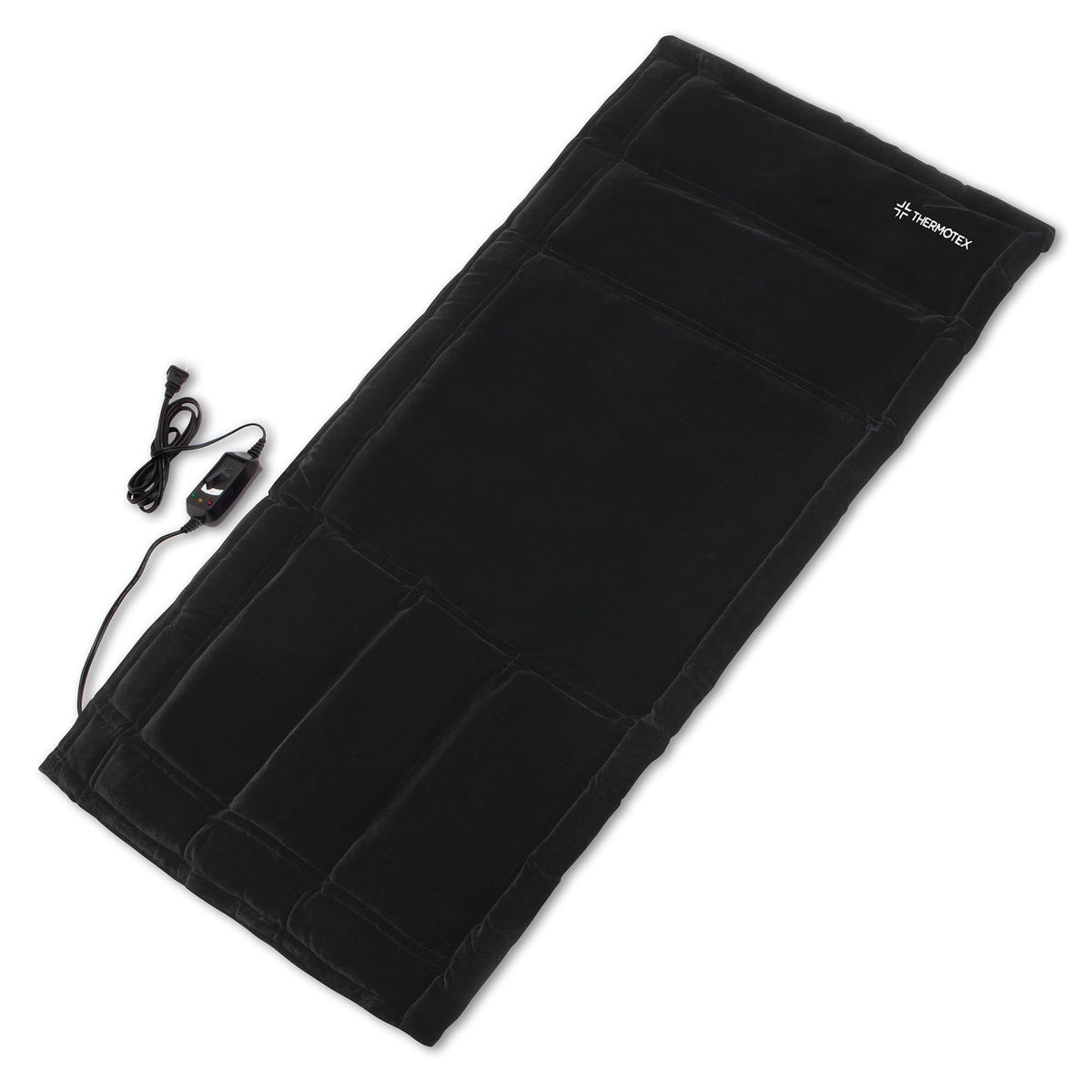 Thermotex Professional heating pad on a treatment table providing targeted warmth for warm-up