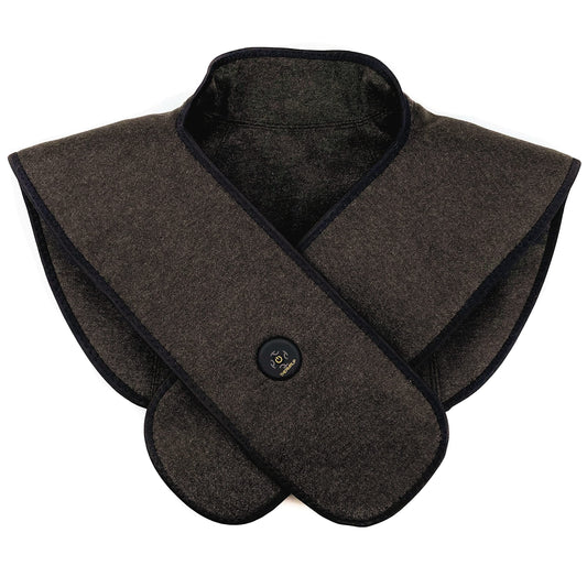 Thermrup neck and shoulder heating pad in use provides targeted warmth.