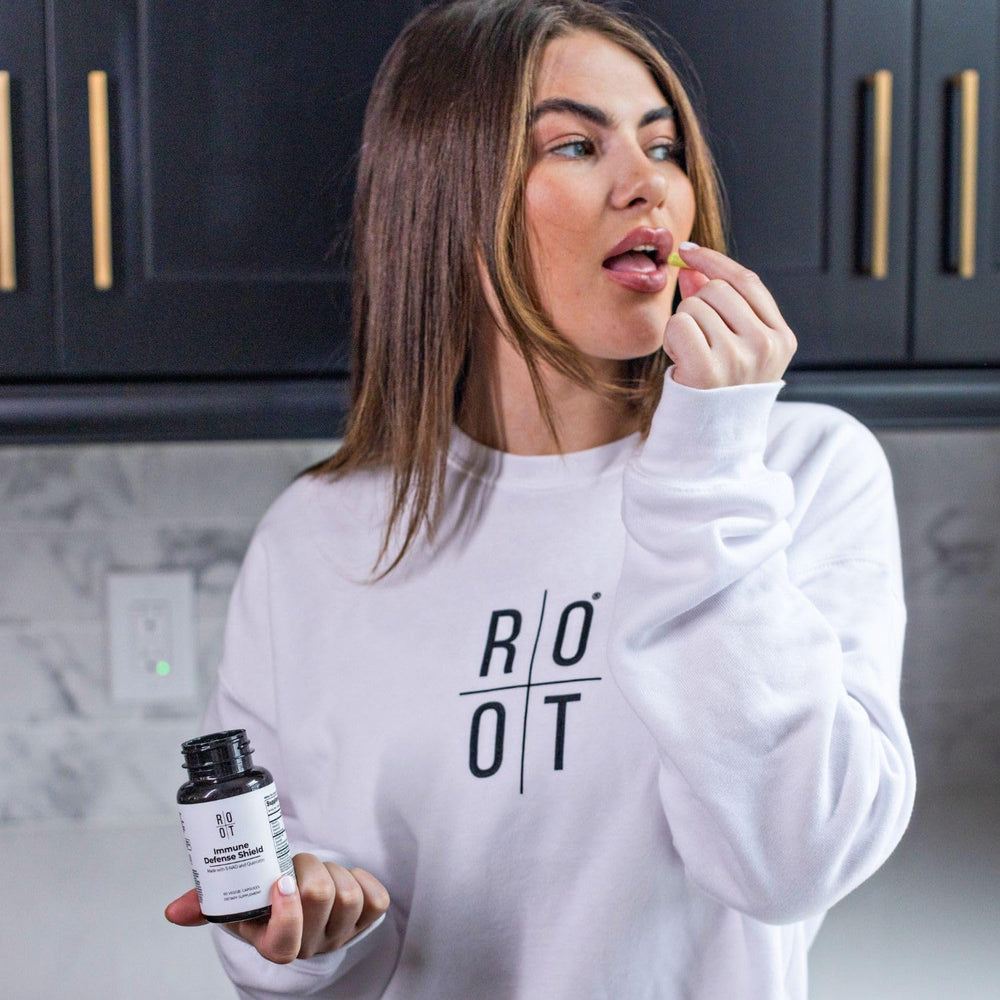 TheRootBrands Root Wellness Immune vitamin D C K2 bottle highlights key nutrients.