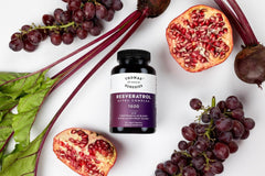 Resveratrol capsules stacked to illustrate easy daily dosing.