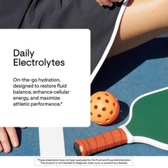 Thorne Daily Electrolytes Watermelon in a glass after mixing for a crisp drink