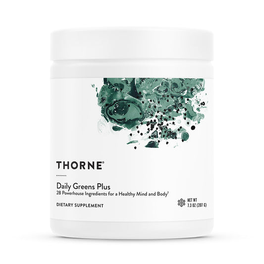 Thorne Daily Greens Plus bottle in kitchen for daily wellness routine.