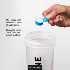 Active athlete using THORNE magnesium bisglycinate for post-workout muscle relief