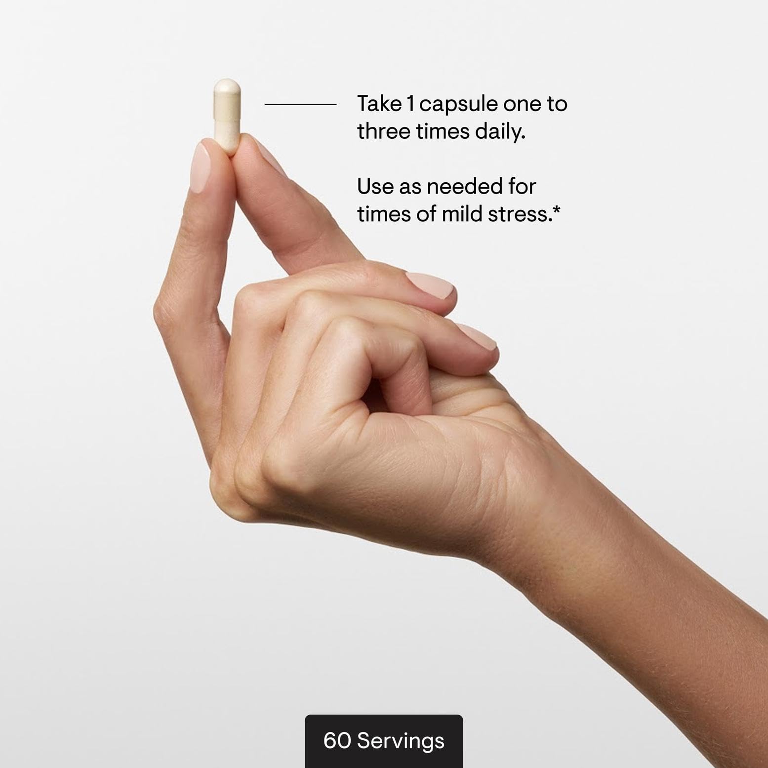 Thorne PharmaGABA-100 capsules in hand for easy daily dosing.