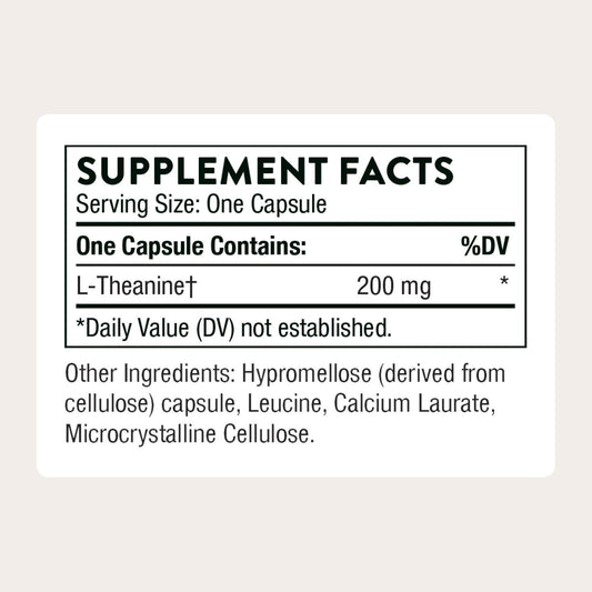 Close-up of THORNE Theanine capsules for calm focus during study or work.