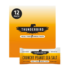 Hand holding Thunderbird Bars 1.7 oz bar, convenient snack.
