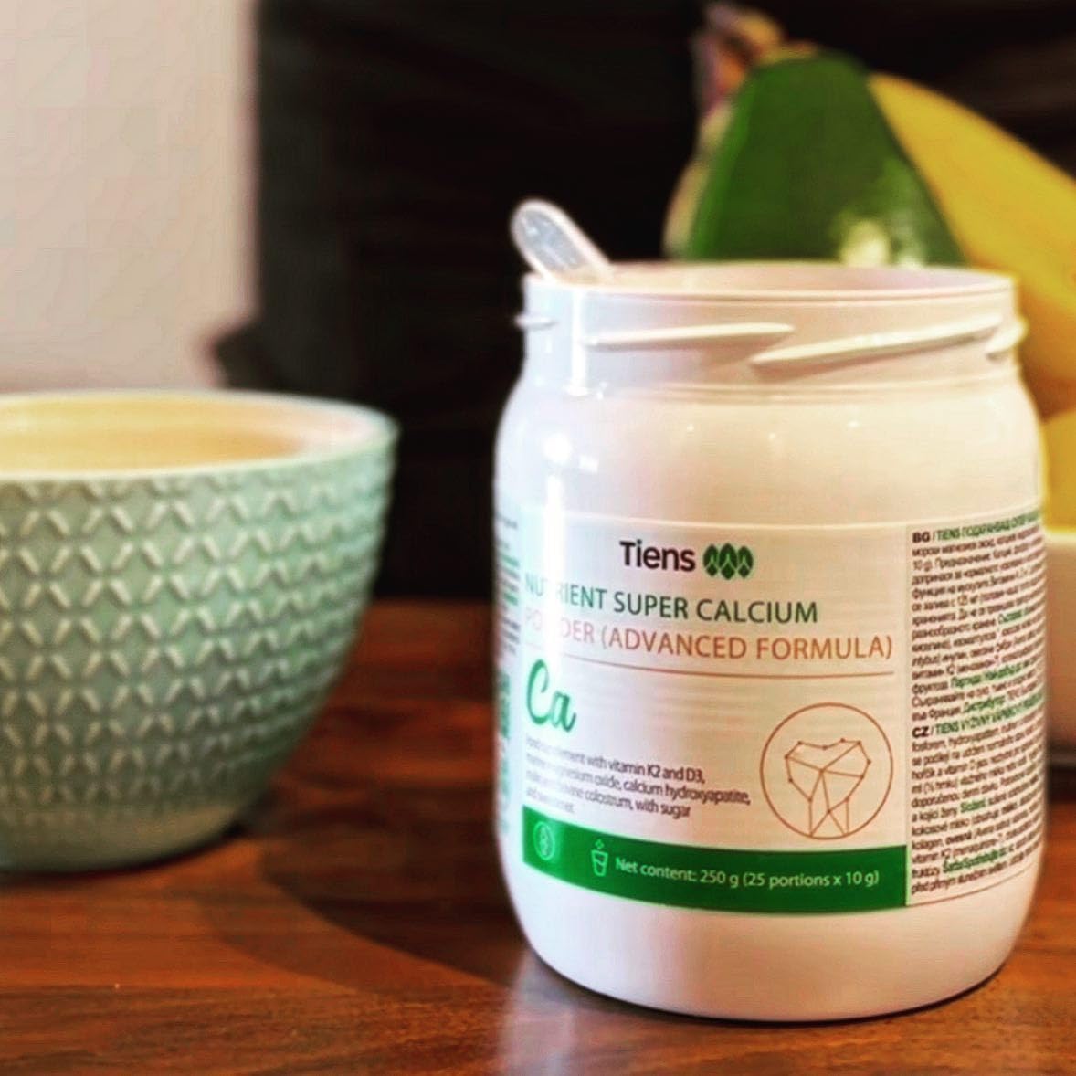 TIENS Nutrient Super Calcium Powder daily use on kitchen counter.