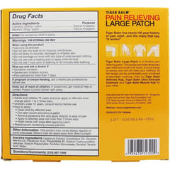 Tiger Balm Pain Relieving Patch Large applied to skin demonstrates easy application for soothing sore areas.