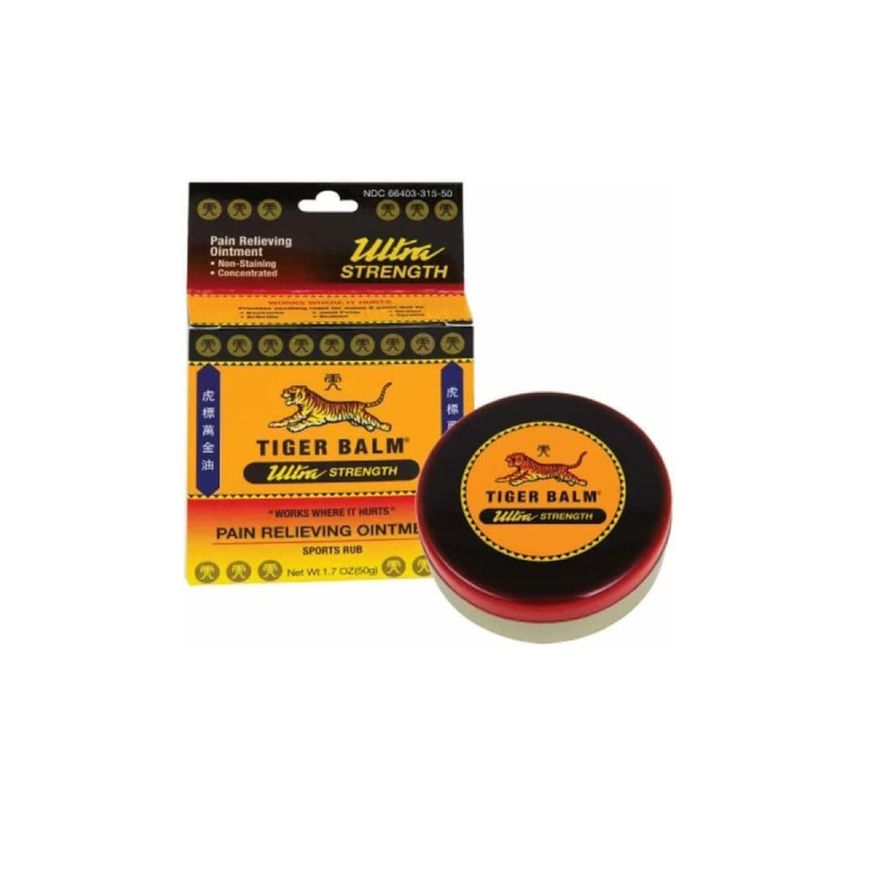 Tiger Balm Sport Rub compact jar on desk for quick recovery moments.