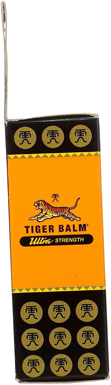 Application on the shoulder with Tiger Balm Ultra Strength for quick warming comfort