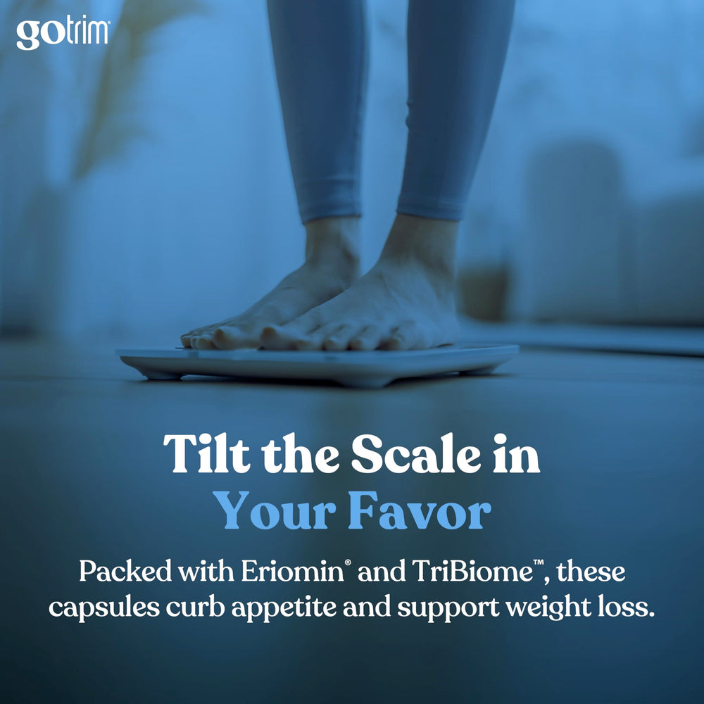 TLS GoTrim vegan capsules in a cup illustrating convenient daily use.