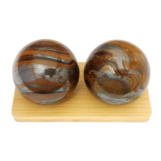 Top Chi Tiger Iron Baoding Ball close-up showing iridescent layers for calm focus.