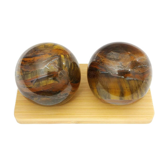 Top Chi Tiger Iron Baoding Ball in hand for quiet hand therapy and dexterity.