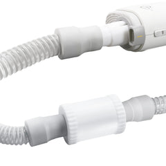 Tordale AirMini muffler in use demonstrating quieter CPAP sleep on the go.