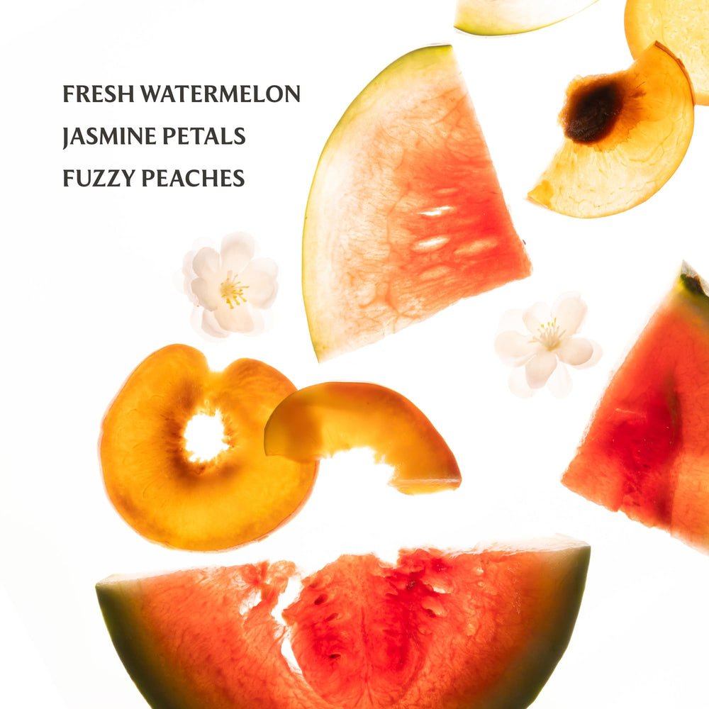 Close-up of Touchland Wild Watermelon label showing vegan, dermatologist-tested formula