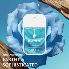 Touchland Blue Sandalwood bottle close-up with calm fragrance and hydration.