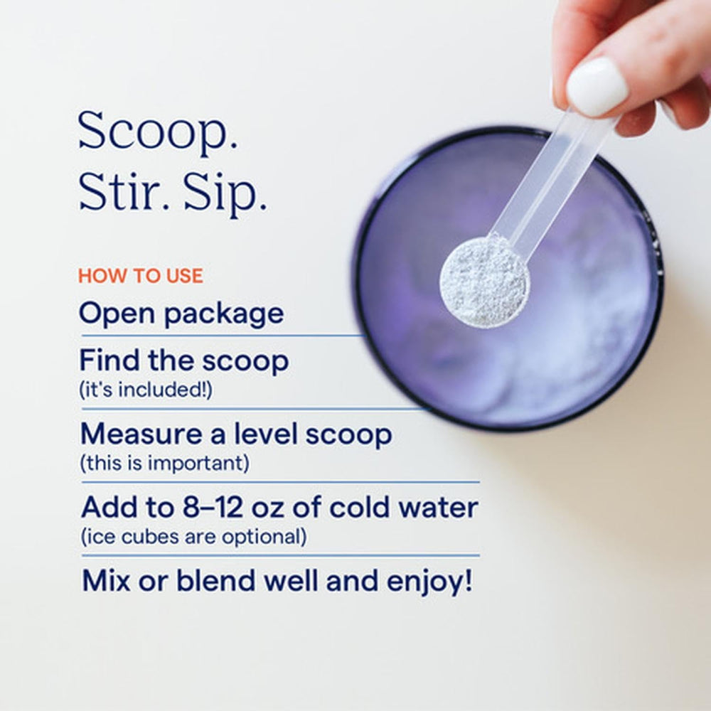 Glass of water with ConcenTrace powder ready to drink, sugar-free formula.