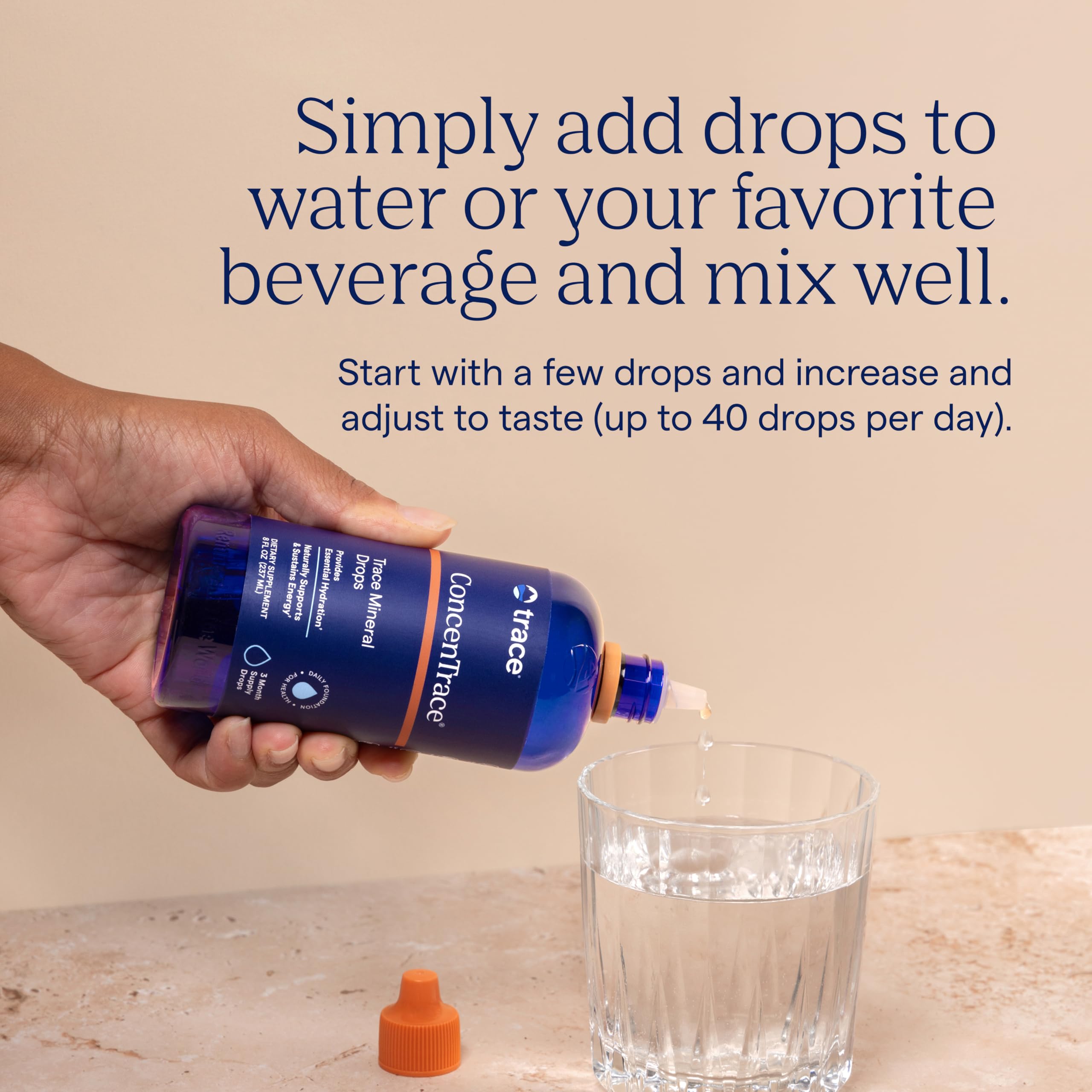 Trace Minerals ConcenTrace liquid drops being measured with dropper close-up
