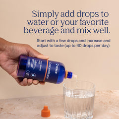 Trace Minerals ConcenTrace liquid drops being measured with dropper close-up