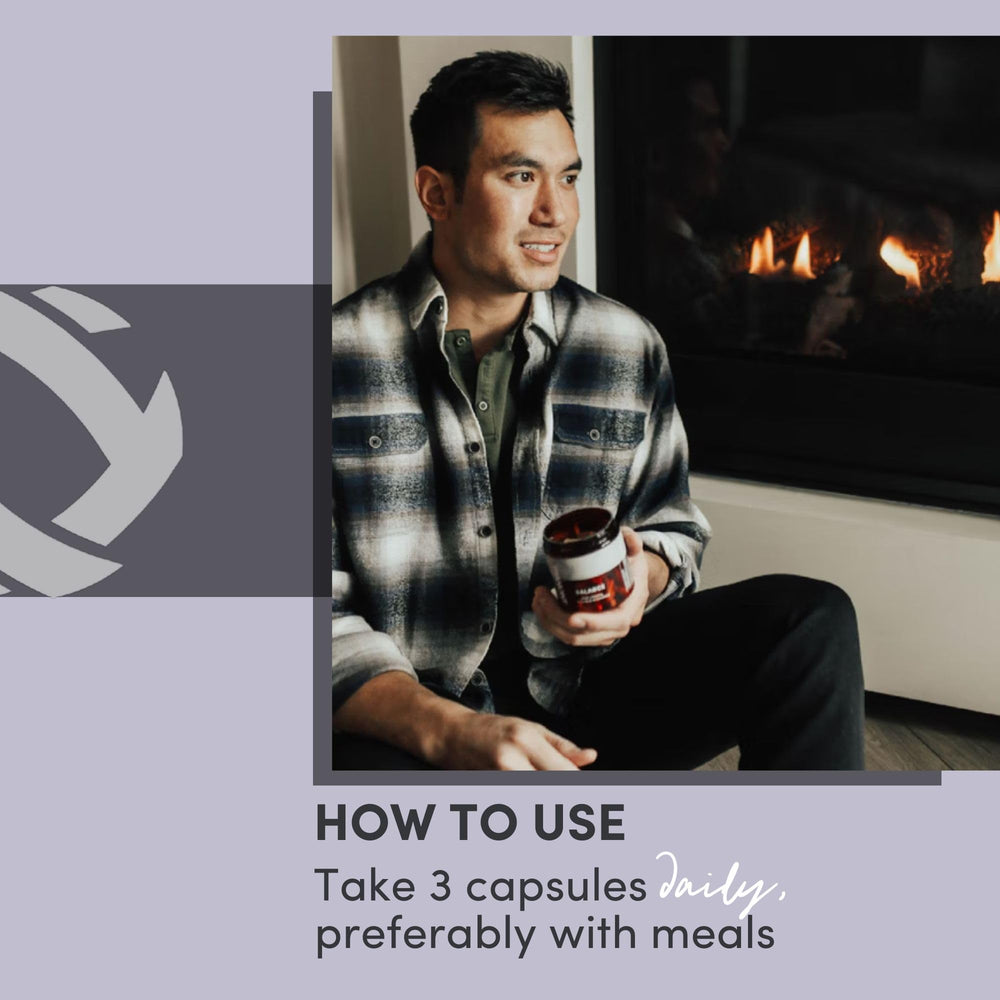 Tranont Balance capsules beside water, illustrating digestion-friendly use.