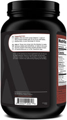 TransformHQ Whey Protein Isolate mixing glass with powder measure for quick shakes.
