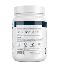 Lifestyle shot of a trainer mixing Transparent Labs Bulk Pre-Workout before training.