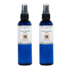 Travertine Spa 4oz bottle releasing eucalyptus aroma for a spa-like shower experience.