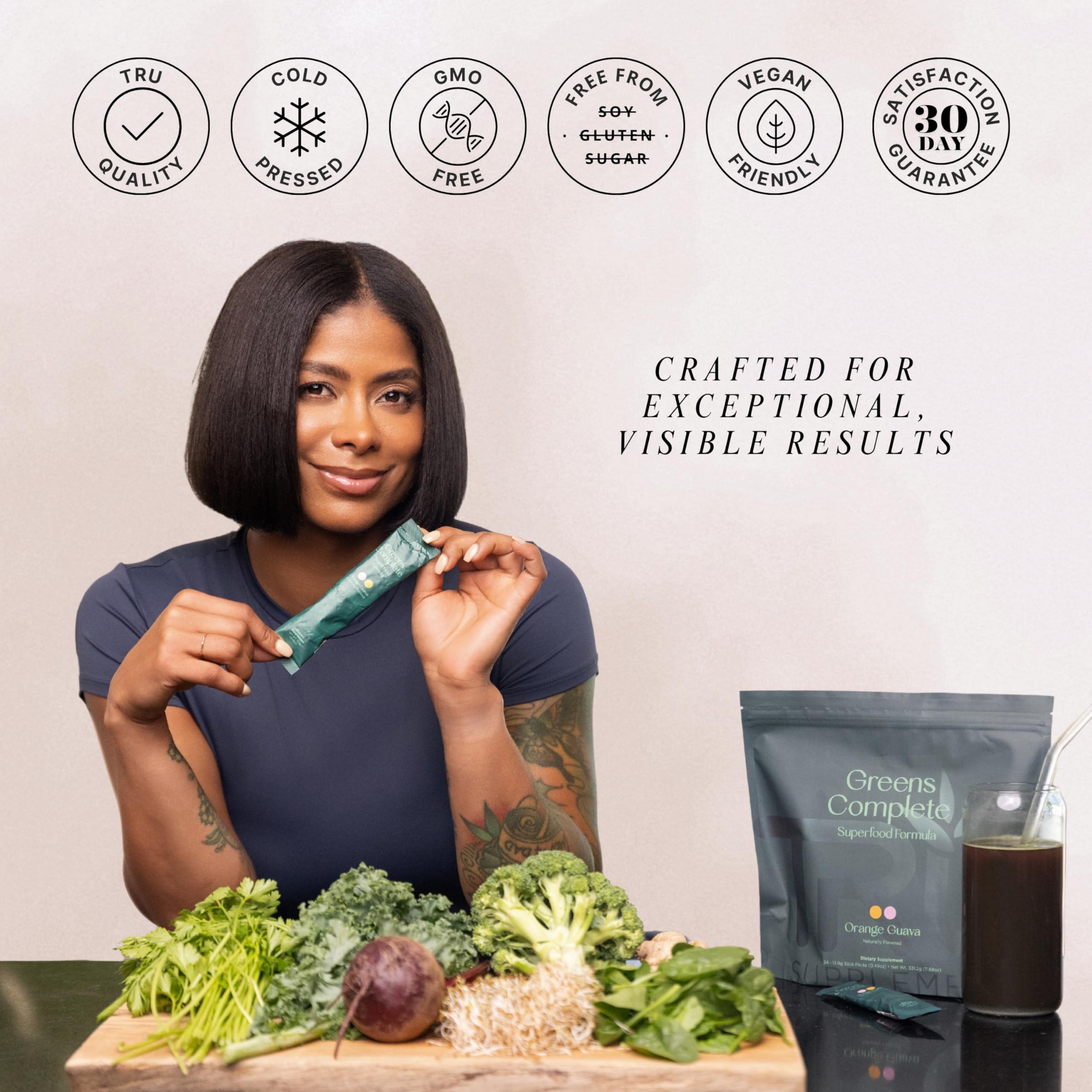 TRU Greens Complete shake with orange guava flavor—refreshing hydration.