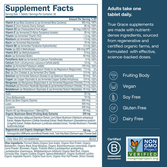 Close-up of True Grace multivitamin label highlighting fermented minerals and organic ingredients.