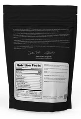 Pouring True Nutrition egg white protein into a glass for a zero-fat shake.