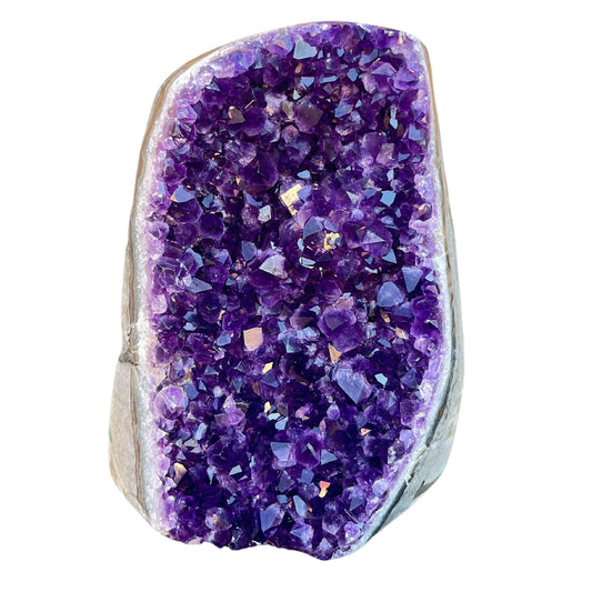 TruEnergy polished amethyst cluster with deep purple hue and rounded edge for display.