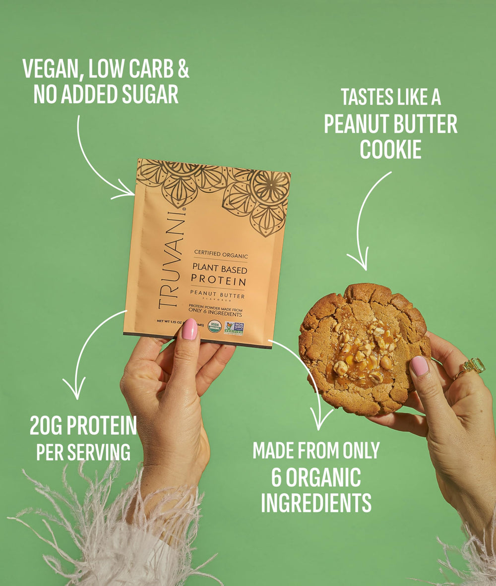 Truvani protein powder scoop ready to mix into a shake, peanut butter flavor