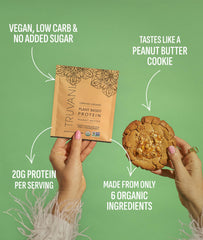 Truvani protein powder scoop ready to mix into a shake, peanut butter flavor