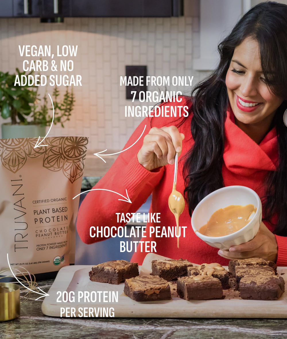 Truvani protein shake in glass shows creamy chocolate peanut butter texture.