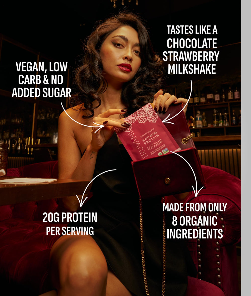 Truvani chocolate strawberry shake in glass demonstrates smooth, tasty plant protein.