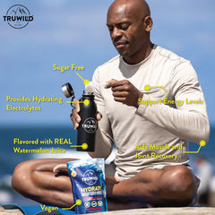 TruWild Hydrate powder whisked into water during activity