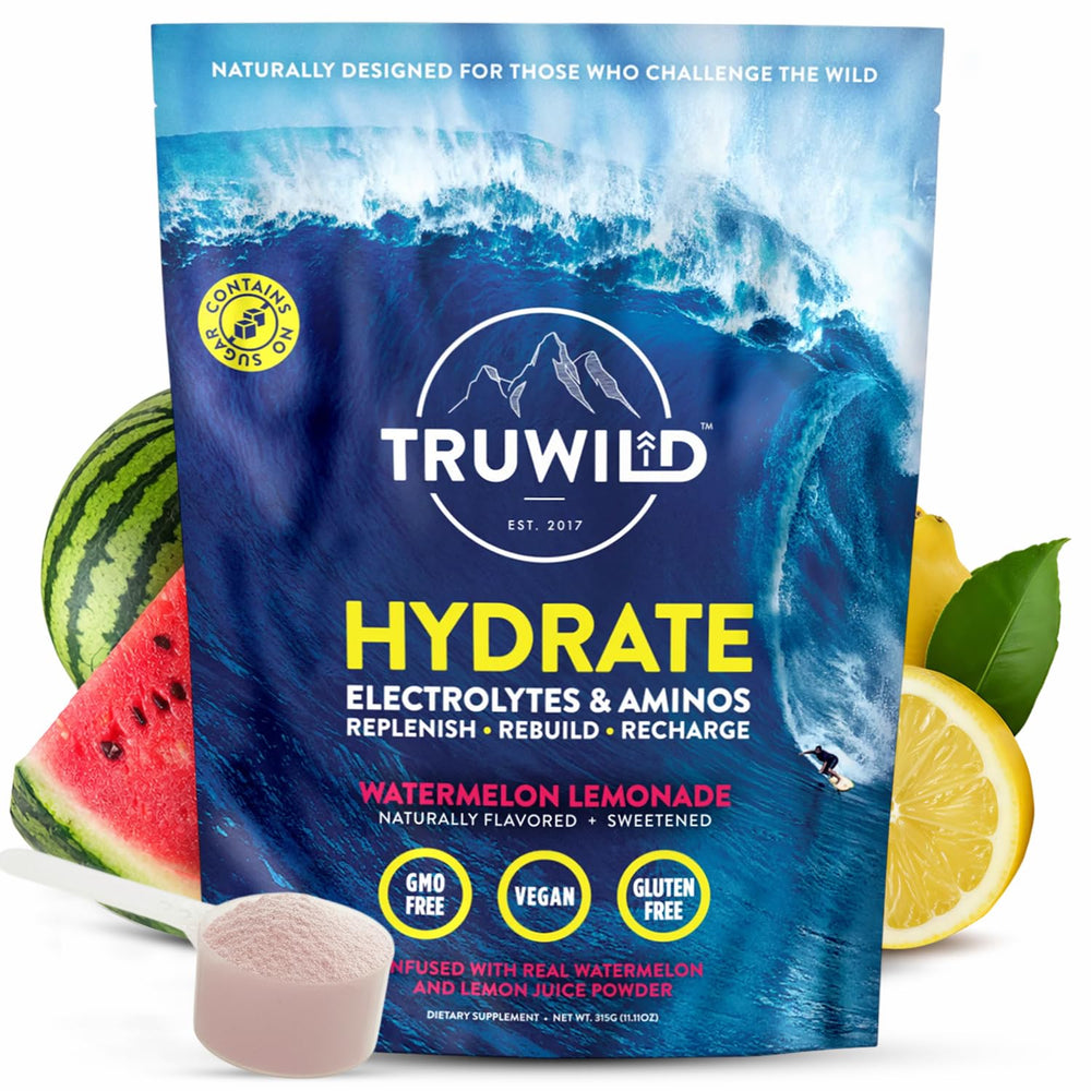 TruWild Hydrate powder poured into a glass for on-the-go hydration