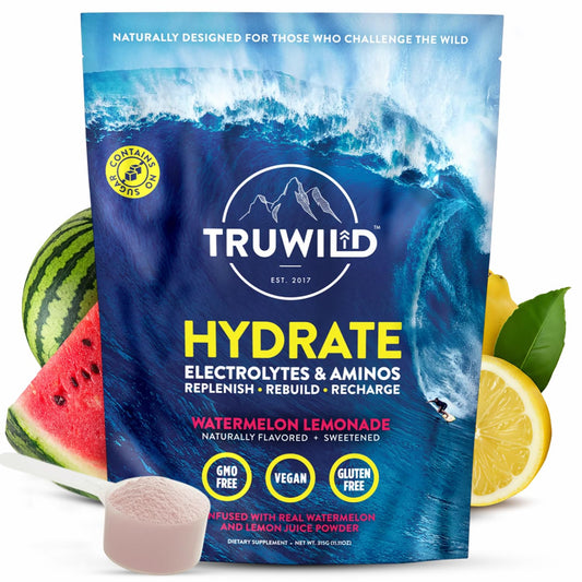 TruWild Hydrate powder poured into a glass for on-the-go hydration