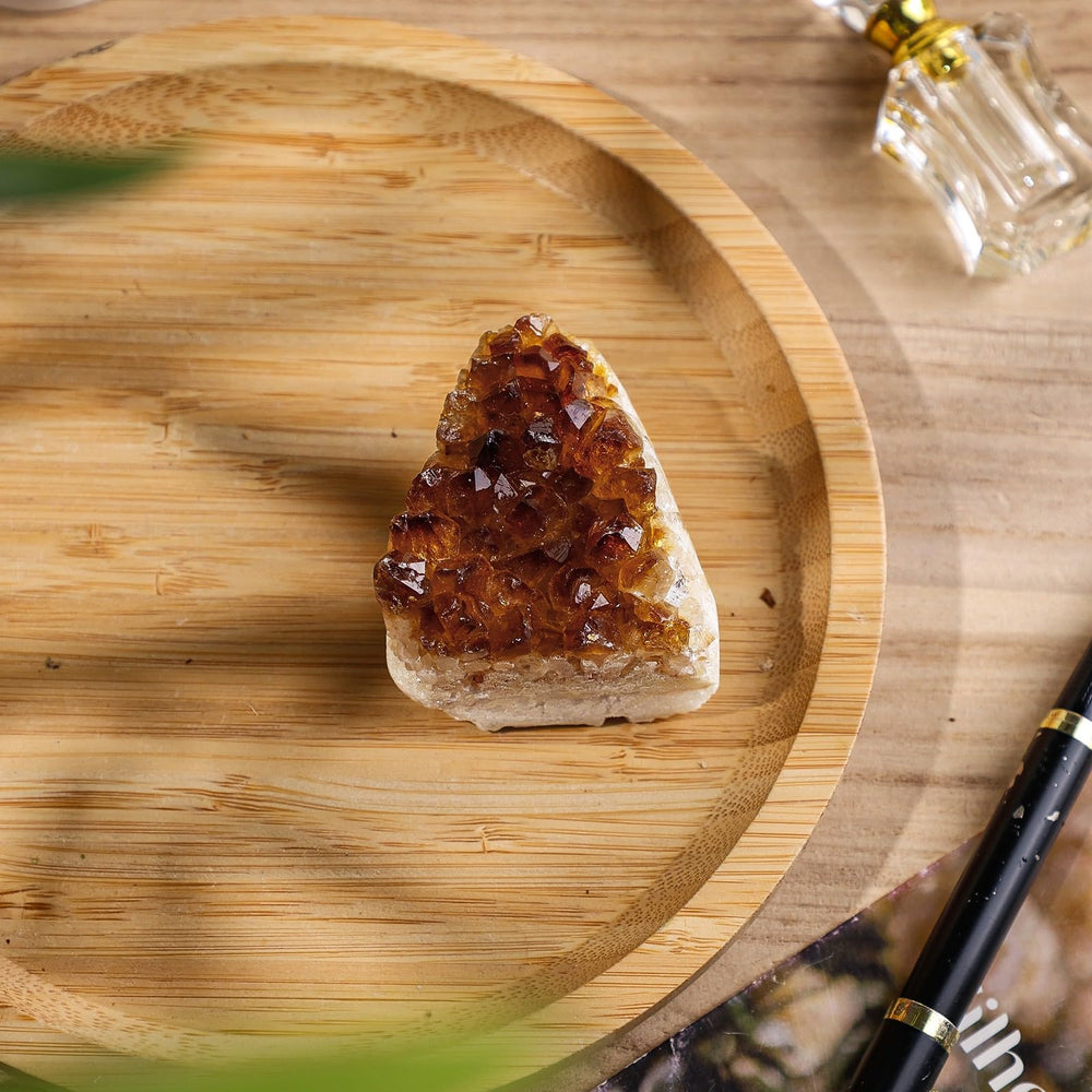 Citrine crystal arrangement positioned on a shelf for visual interest