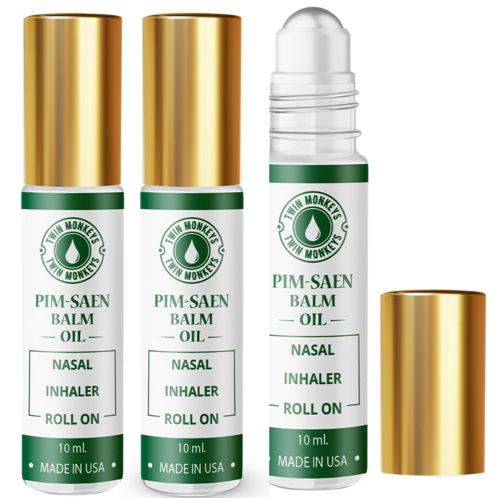Twin Monkeys Oil PIM-SAEN Roll-On bottle close-up for on-the-go relaxation.