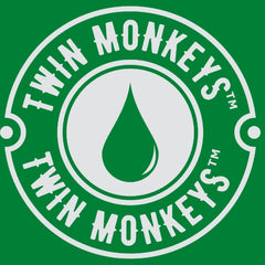 Twin Monkeys Oil relaxation scene conveying aromatic calm.