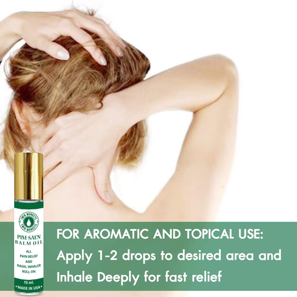 Twin Monkeys Oil Roll-On held in hand for easy portability.