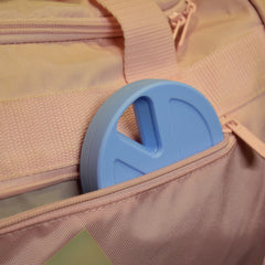 Travel RX Pill Case carabiner hole enables convenient bag attachment.